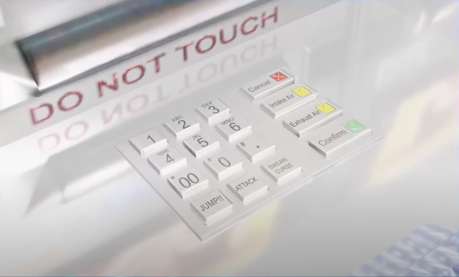 A keypad which features an unusual keypad layout, including standard number keys and unique buttons labeled 'JUMP!!', 'ATTACK', and 'SWEAR/CURSE'. There are also system control buttons: 'Cancel' with a red X, 'Intake Air' and 'Exhaust Air' with yellow indicators, and 'Confirm' with a green symbol.